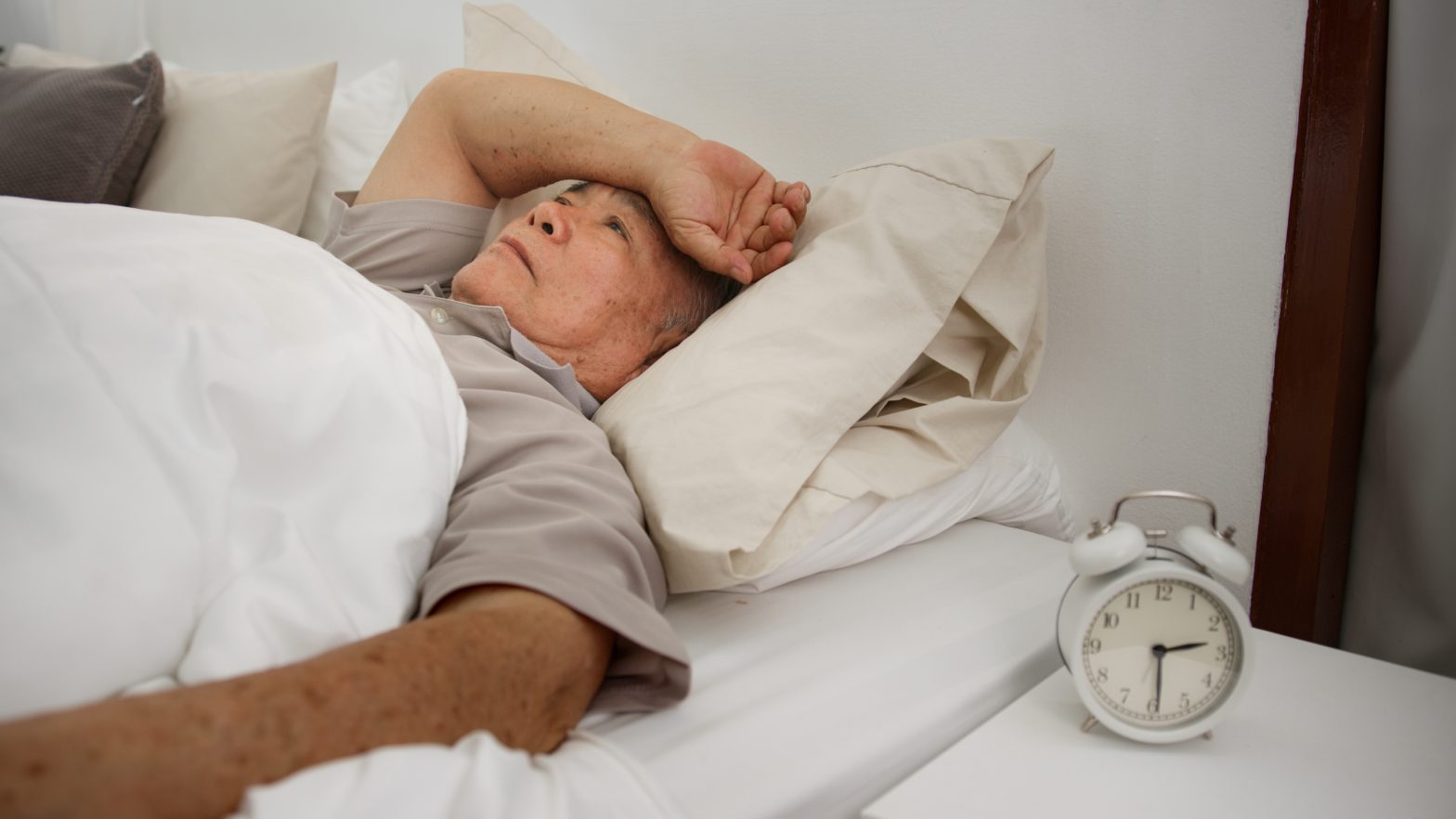 Senior Man Having Difficulty Falling Asleep